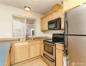 Kitchen with maple cabinets