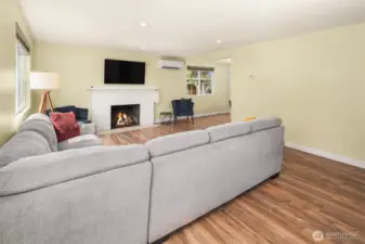 Spacious living room with cozy fireplace