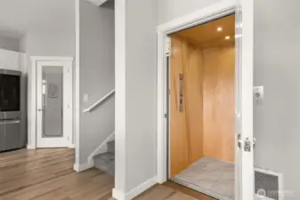 This fabulous elevator serves all 3 floors.