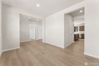 Convenient passthrough from dining room to kitchen of the home perfect for hosting. Photo is representational. Home is under construction and finishes, features, and colors may vary. See site agent for details.
