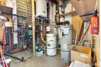 On demand water heater and circulatory radiant floor heating system