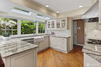 Inside, you’ll find a gourmet kitchen equipped with Thermador and SubZero appliances.