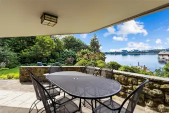 Expansive upper-level decks and stone patio