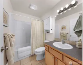 Full guest bathroom right next to guest bedroom.