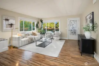 Living Room with exterior door to backyard