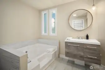 Primary bathroom with shower and soaking tub