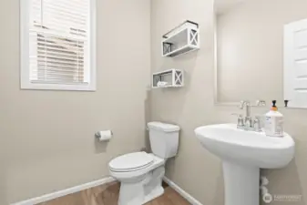 Main level powder room next to the office. Perfect for guests.