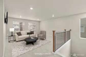 Huge upstairs family room just to the right, across from the primary bedroom. So many options!