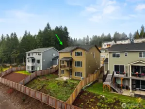 Fully fenced backyard just needs your vision.