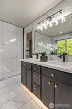 Primary bath with lots of custom and elevated features.