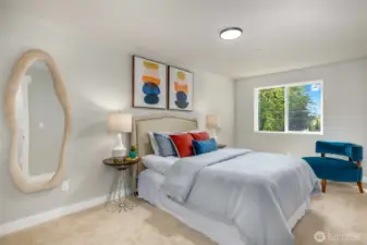 One of the four bedrooms on the upper level.