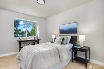 One of the four bedrooms on the upper level.