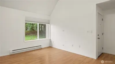 Tons of light pours through this large window and brightens the room.