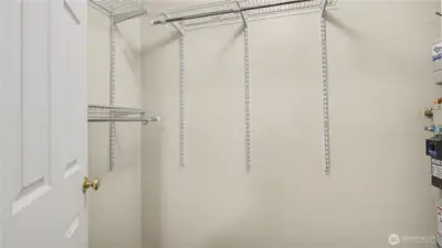 Closet offers ample space for everyday essentials.