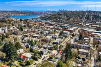 Sweeping views of the Cascades, Mt. Rainier, the Ship Canal Bridge take center stage in this light-filled home perched between Phinney Ridge and Fremont.