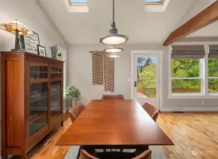 Open concept dining area with skylights.