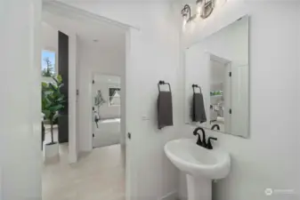 Powder room off great room.