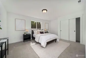 Another large bedroom with greenbelt views.