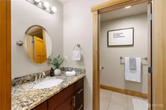 Guest suite 3/4 bath with private water closet and stand up shower.