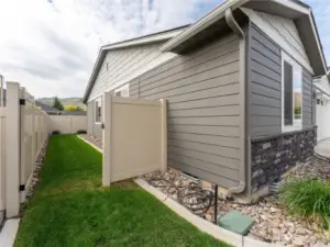 Side yard with gate to rear yard