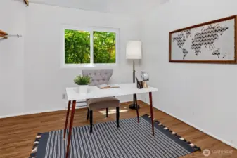 The second bedroom is staged as an office, and is also quite large.