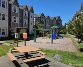 Playground with picnic benches, located in the other units area, keeps this unit very quiet.