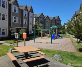 Playground with picnic benches, located in the other units area, keeps this unit very quiet.