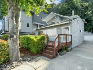 Front of Home with Personal Driveway to Detached Garage on the right