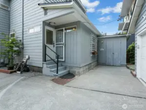 Rear entrance to the home leading to the  detatched garage.