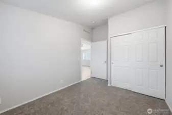 One of two secondary bedrooms off main living area.