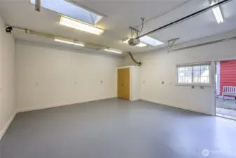 Second garage/workshop entrance near the front gate