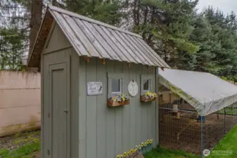 One of the several sheds on the property. And the covered chicken coop!