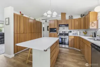 Kitchen with new countertops, stove and fridge