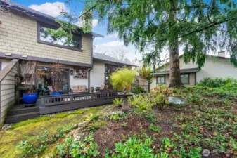 There is a sizable rear deck just off the dining room for outdoor relaxation all summer long. This deck will accommodate an entire suite of outdoor furniture.