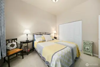 Primary bedroom with closet.