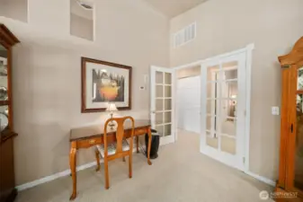 Glass French doors can separate the living room from the bedrooms and bathrooms, if desired.