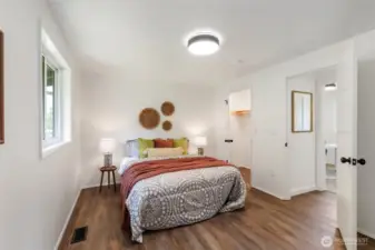 Walk in closet in the primary bedroom.