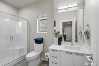 Main floor 3/4 bath makes it convenient for guests and multi-gen. living