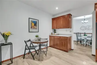 Kitchen with wood cabinets, lots of storage & eat in area.
