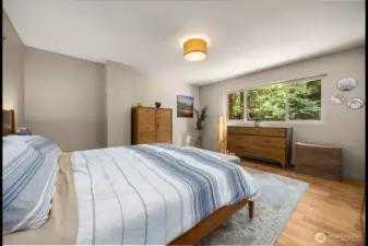 First  of 2 Primaries Bedrooms with attached 3/4 bath on the Main Floor