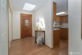 Welcoming entrance with skylights