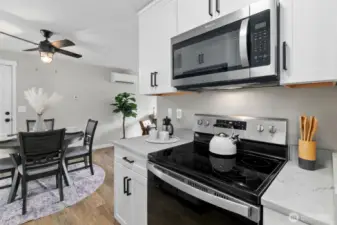 All Kitchen appliances convey with the home! A sizable pantry is to the right around the corner. (not pictured)