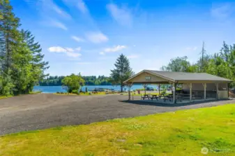 The covered picnic area offers plenty of shaded space with electricity and light. This space and the clubhouse are available to rent for parties and other gatherings.