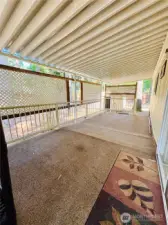 Covered patio off living room entrance