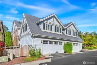 The two car garage is off of the back alley