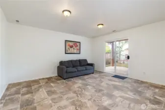 Lower level family room has slider to the covered back deck