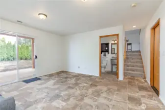 Half bath & laundry; garage to the right