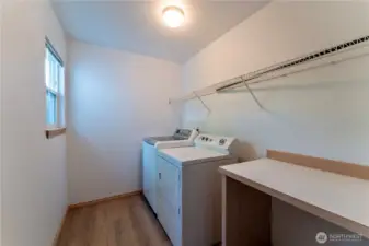 Laundry room conveniently located upstairs next to all the bedrooms.