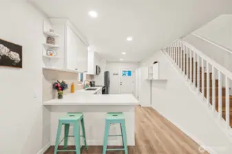 Quartz countertops, breakfast bar.