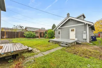 View from garage/shop of the back of this cute home.